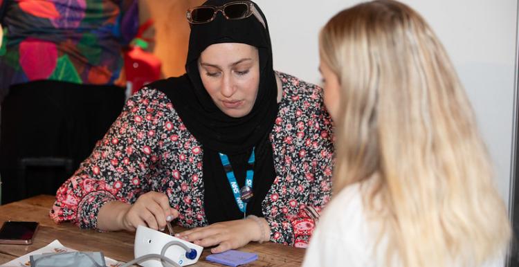 Woman having her blood pressure tested