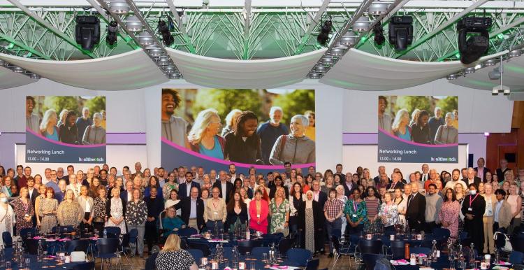 2023 Conference attendees on stage group picture