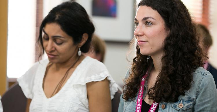 Two women at Healthwatch conference learning Two women at Healthwatch conference learning