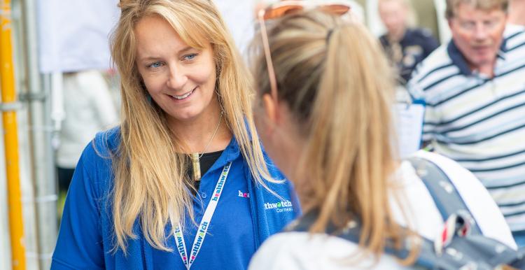 Healthwatch volunteer talking to a member of the public