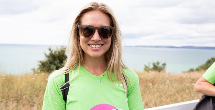 Woman wearing sunglasses and smiling Woman wearing sunglasses and smiling