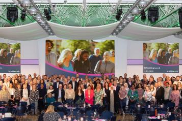2023 Conference attendees on stage group picture 
