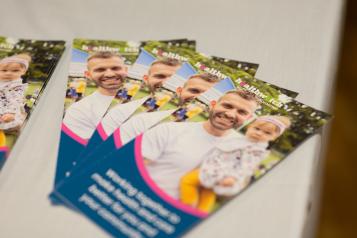 Four annual reports on a table