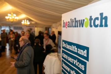 A Healthwatch sign with writing: 'Do health and care services know' A Healthwatch sign with writing: 'Do health and care services know'