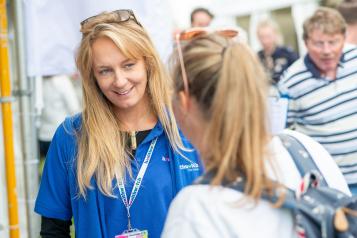 Healthwatch volunteer talking to a member of the public