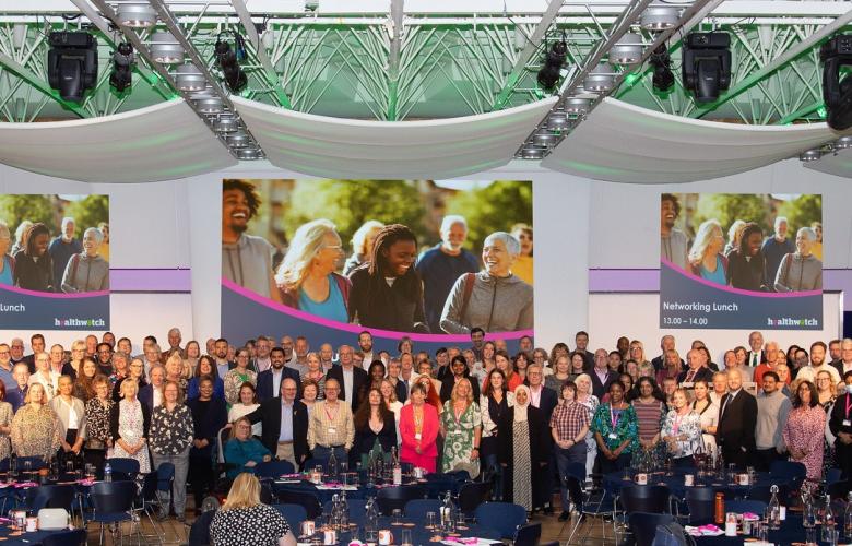 2023 Conference attendees on stage group picture 